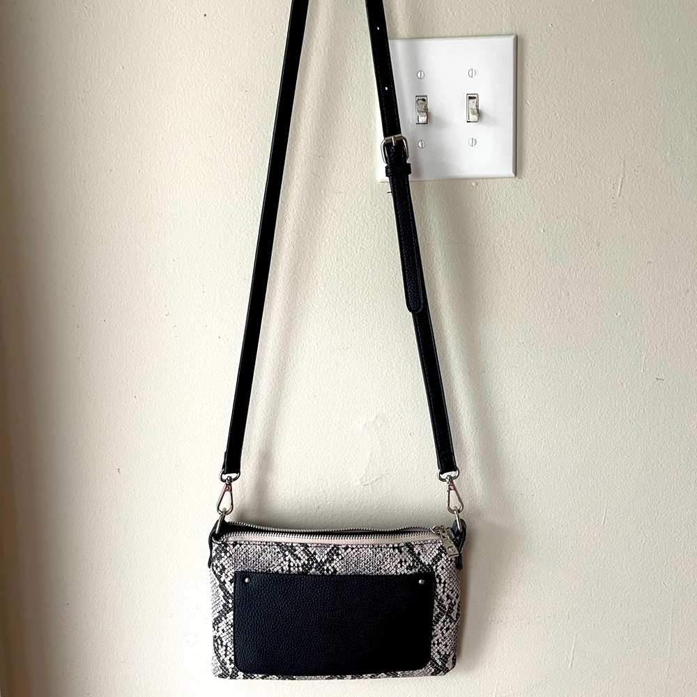Charming Charlie adjustable cross body snake print purse